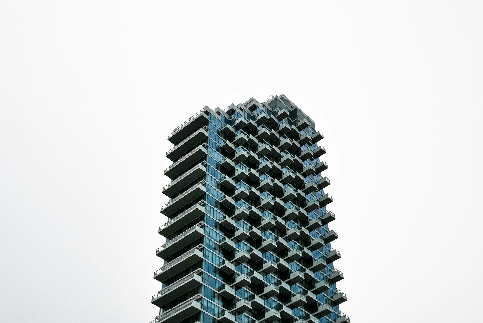Contemporary glass condominium tower — modern residential high-rise development in Vaughan